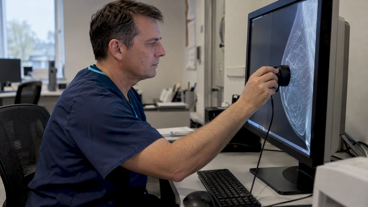 Medical physicist measuring diagnostic display luminance